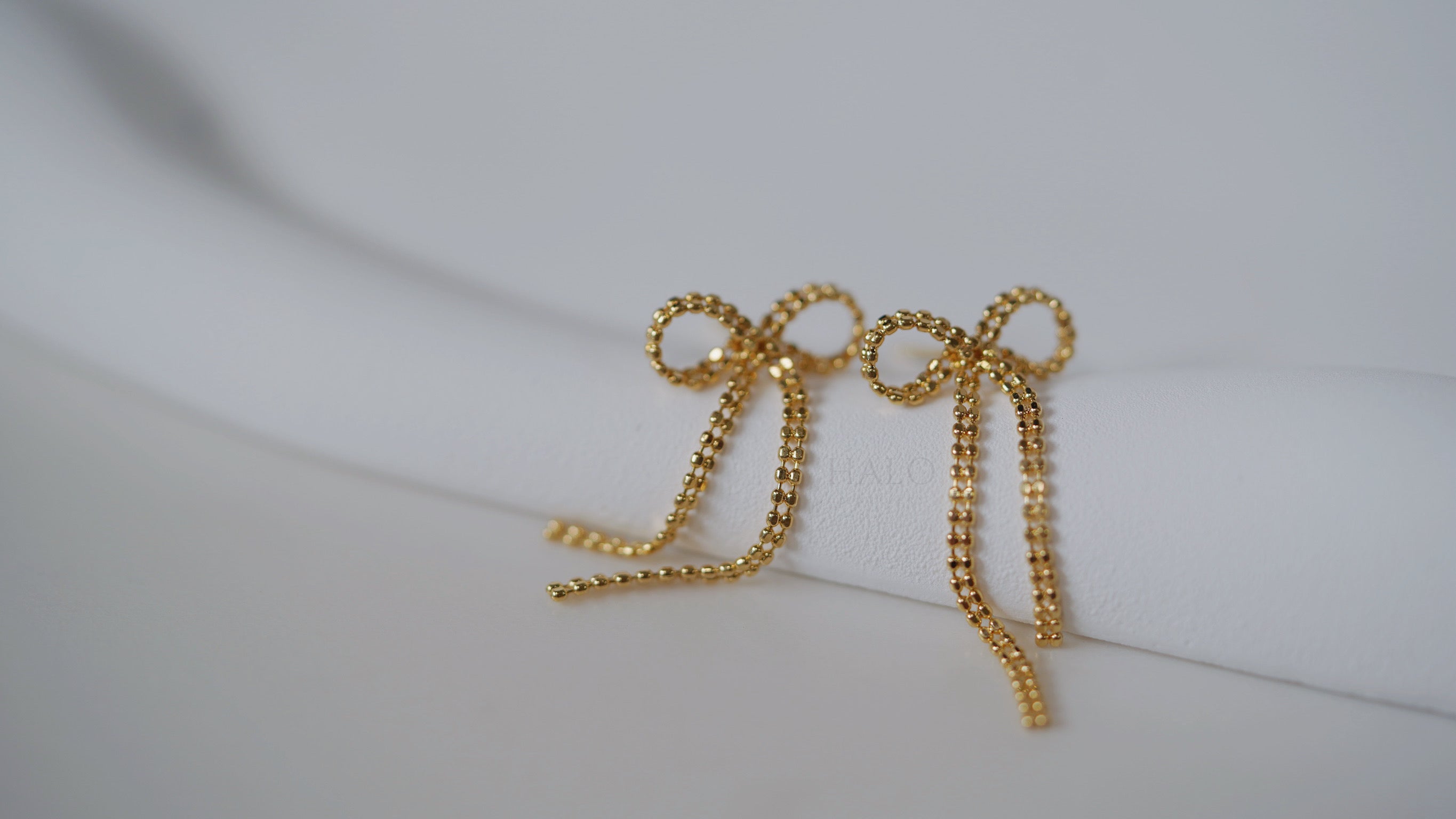 垂墜蝴蝶結耳環 (一對）