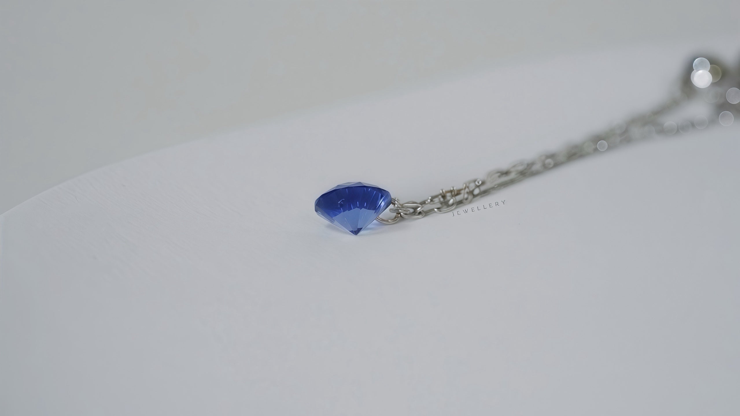 懸浮彩色藍寶石鏈戒